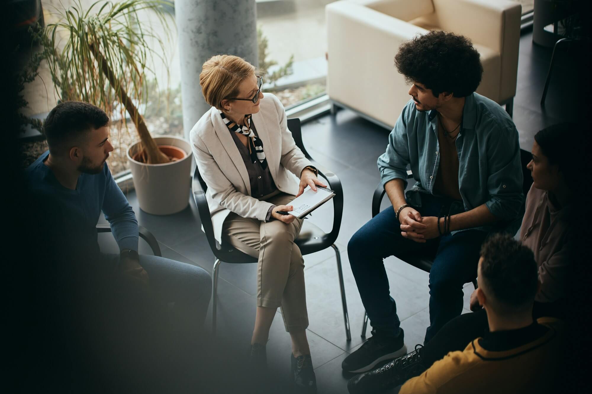 Group therapy setting representing mood, cognitive health, and emotional wellbeing